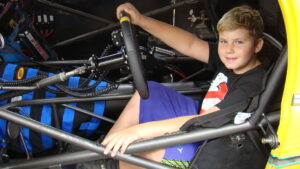 boy in racecar